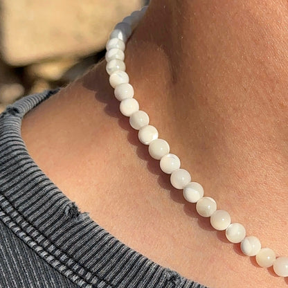 COLLIER FLEUR DE MONOÏ NACRÉ